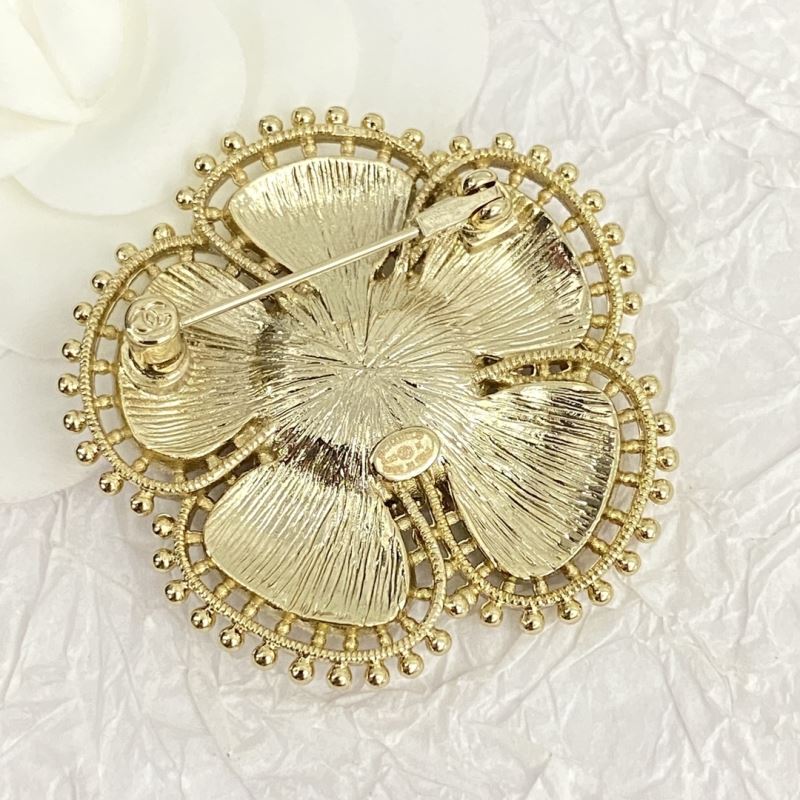 Ch**el brooches